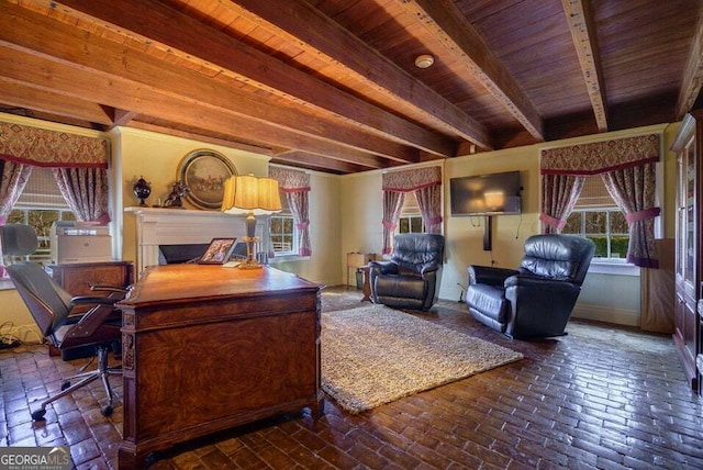 living room featuring beamed ceiling, brick floor, and wood ceiling