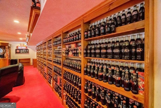 wine cellar featuring carpet and recessed lighting