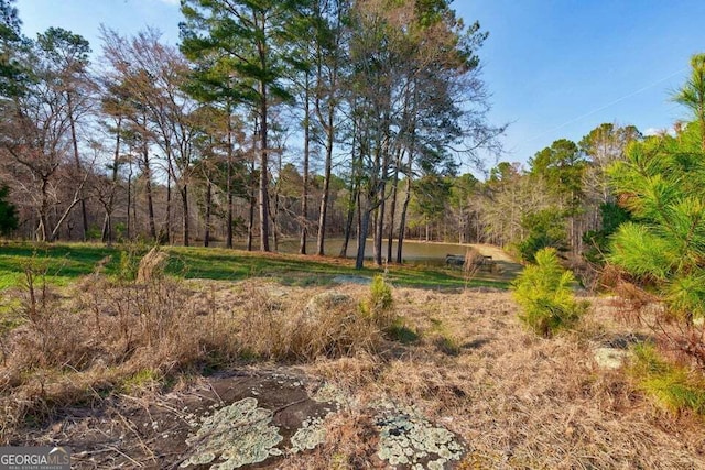 view of landscape with a view of trees