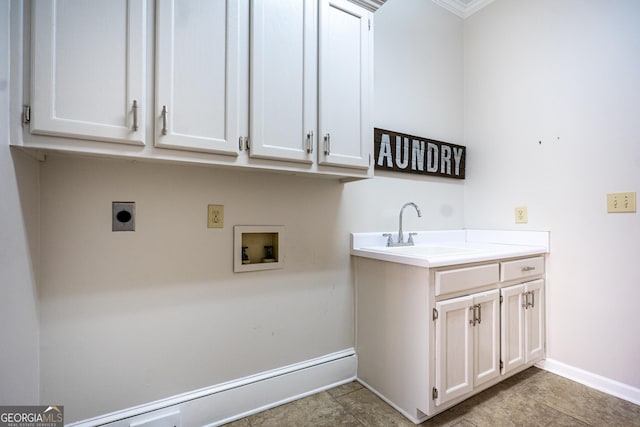 washroom with cabinet space, baseboards, electric dryer hookup, washer hookup, and a sink