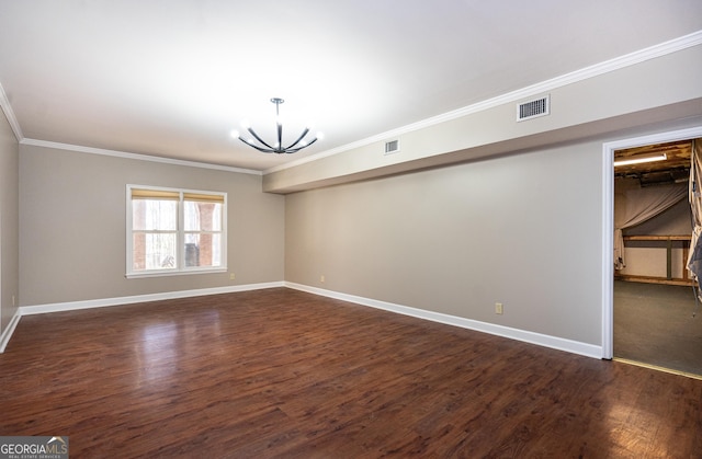 unfurnished room featuring dark wood finished floors, visible vents, and baseboards