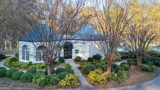 view of front of home featuring stucco siding