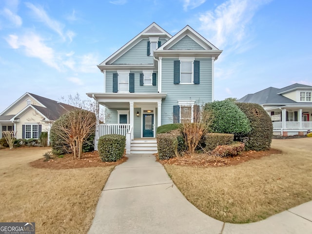 view of front of property featuring covered porch