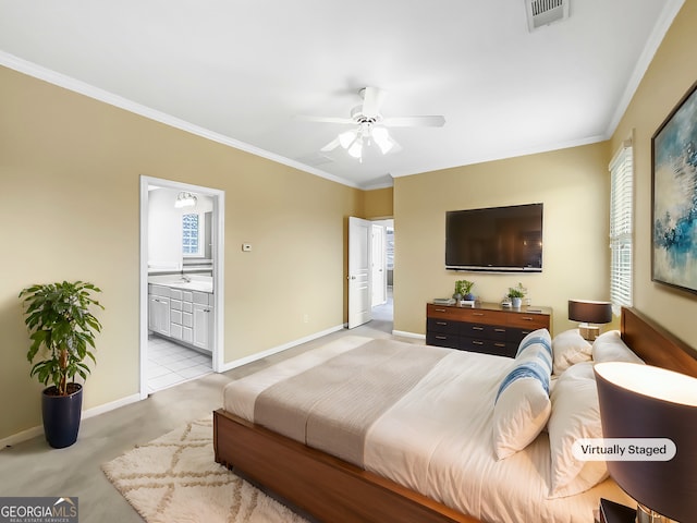 bedroom featuring visible vents, crown molding, and baseboards