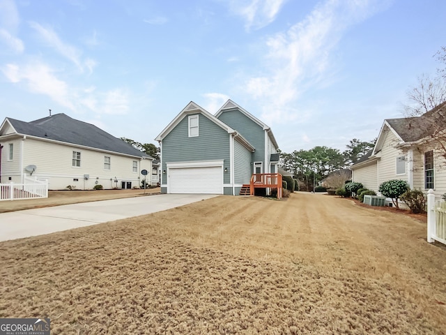 exterior space with driveway and a garage