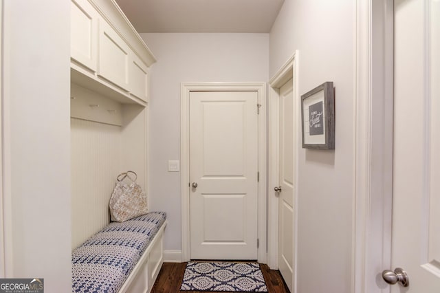 mudroom with dark wood-style floors