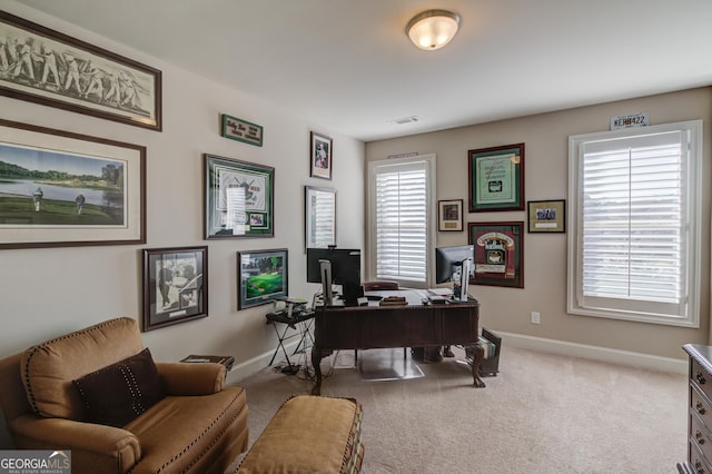 home office featuring baseboards, visible vents, and carpet flooring