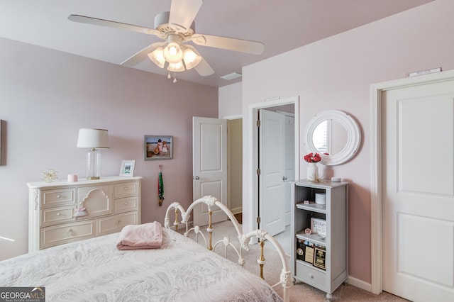 bedroom with light carpet, ceiling fan, and visible vents