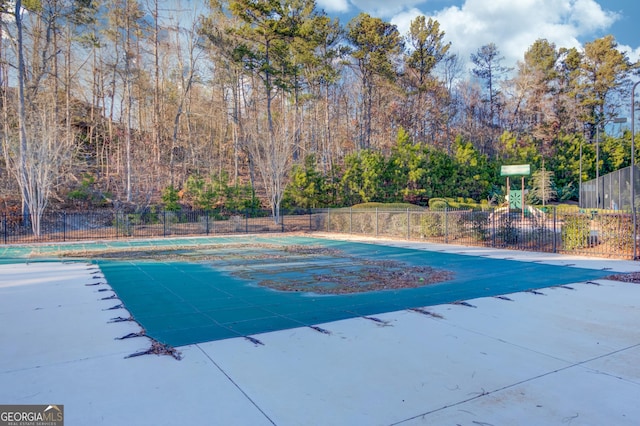 view of pool featuring a fenced in pool and fence