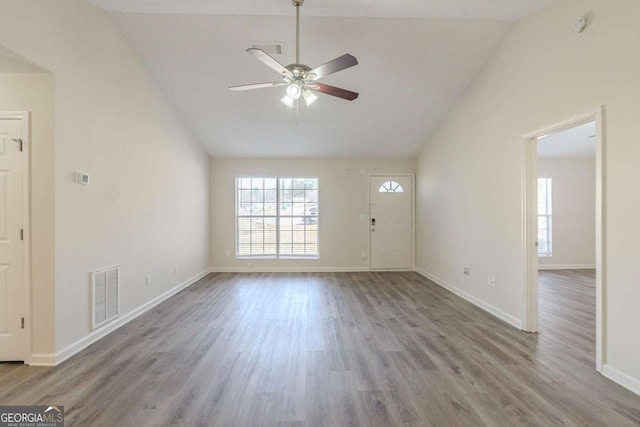 11139 Silver Aspen Ct, Hampton, GA 30228 - foyer featuring vaulted ceiling, a ceiling fan, and wood finished floors
