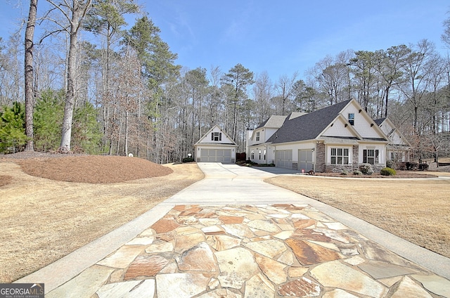 view of front of house featuring concrete driveway