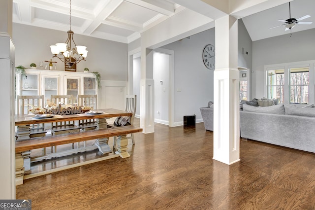 dining area with high vaulted ceiling, ceiling fan with notable chandelier, beamed ceiling, and wood finished floors