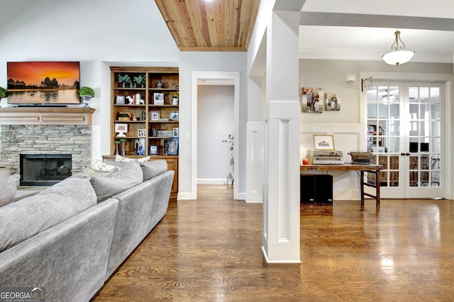 living room with wooden ceiling, a fireplace, wood finished floors, french doors, and crown molding