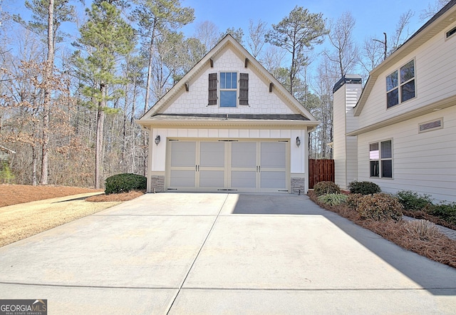 exterior space featuring board and batten siding and a garage