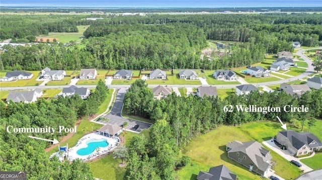 bird's eye view with a residential view and a forest view