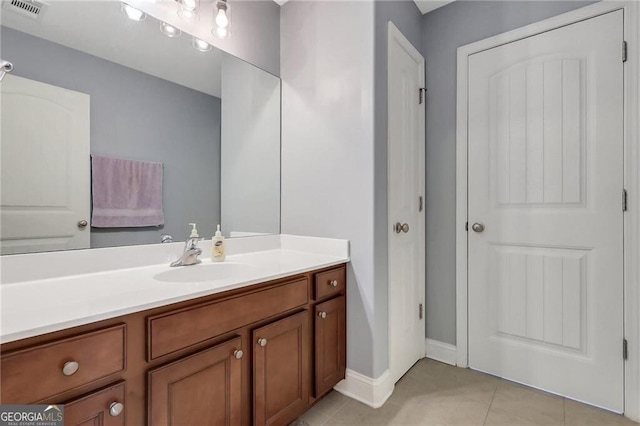 bathroom with vanity, tile patterned flooring, and visible vents