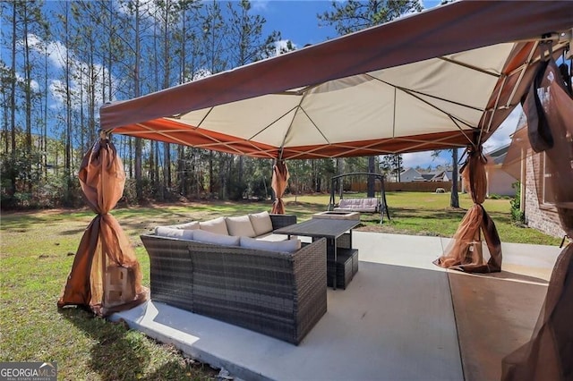 view of patio / terrace featuring outdoor lounge area and a gazebo