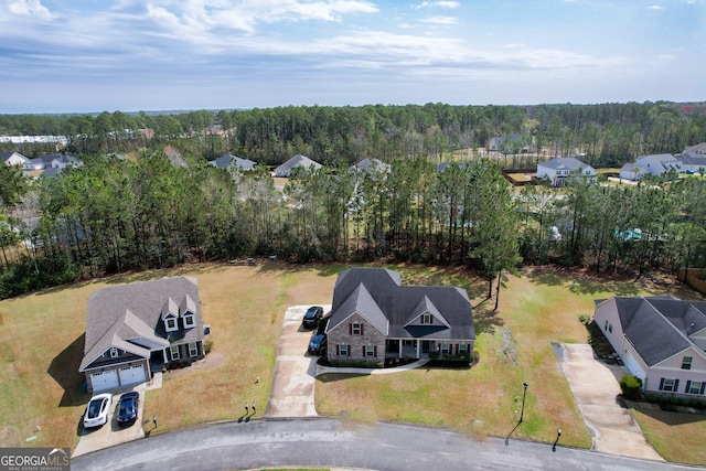 aerial view featuring a view of trees