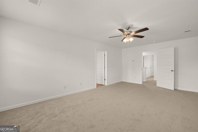 unfurnished bedroom with carpet floors, ceiling fan, and baseboards