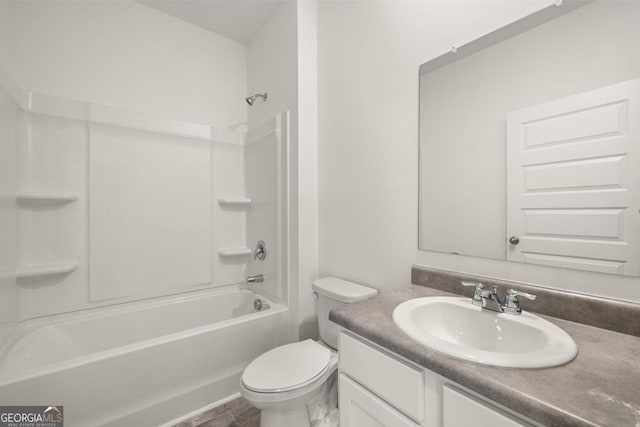 full bathroom with toilet, washtub / shower combination, and vanity