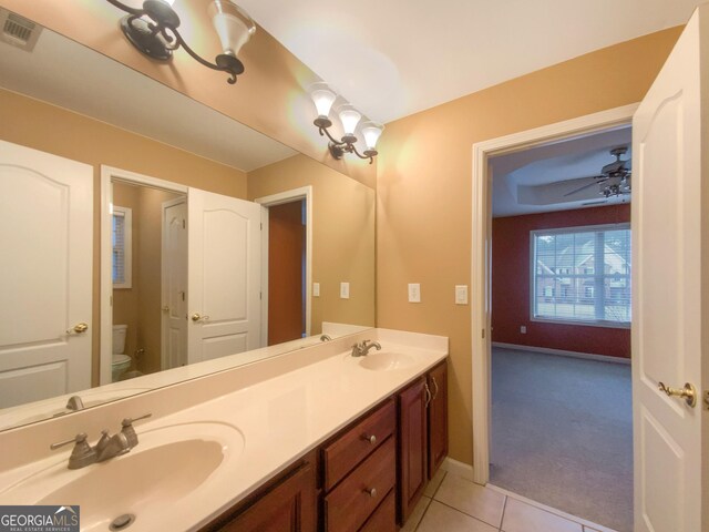 full bath featuring visible vents, a sink, toilet, and ceiling fan