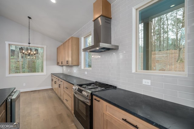544 Lemmon Ln, Ellijay, GA 30540 - kitchen with tasteful backsplash, lofted ceiling, dark countertops, stainless steel range with electric cooktop, and wall chimney range hood