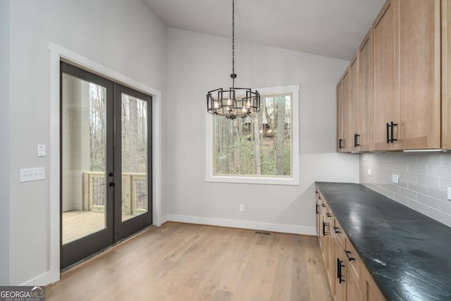544 Lemmon Ln, Ellijay, GA 30540 - unfurnished dining area with vaulted ceiling, french doors, and a healthy amount of sunlight