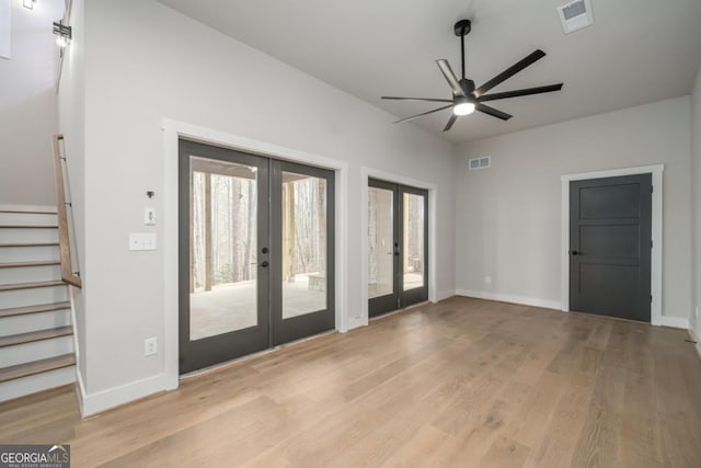 544 Lemmon Ln, Ellijay, GA 30540 - interior space featuring visible vents, baseboards, stairs, french doors, and light wood-type flooring