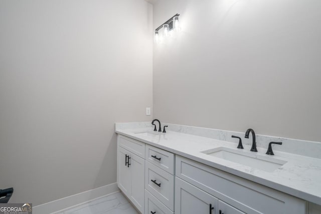 544 Lemmon Ln, Ellijay, GA 30540 - bathroom featuring double vanity, marble finish floor, baseboards, and a sink