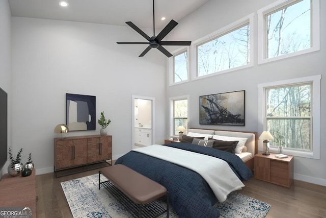 544 Lemmon Ln, Ellijay, GA 30540 - bedroom featuring multiple windows, wood finished floors, and recessed lighting