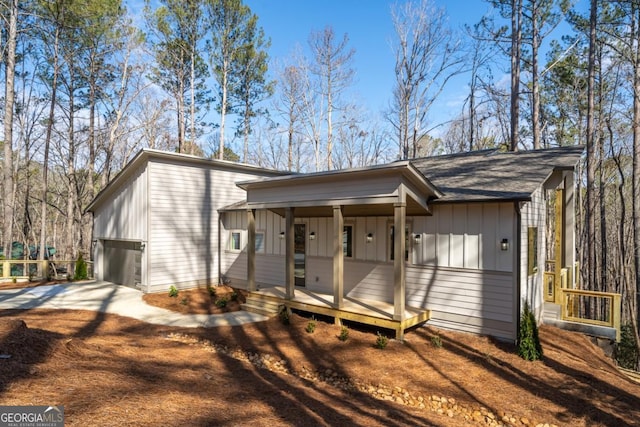 544 Lemmon Ln, Ellijay, GA 30540 - view of front of house featuring driveway, a porch, and board and batten siding