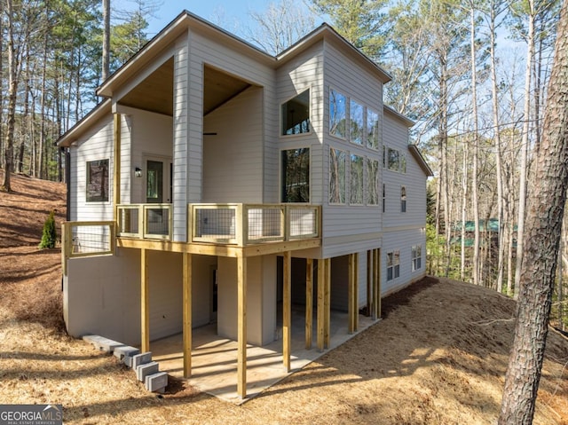 544 Lemmon Ln, Ellijay, GA 30540 - rear view of house with a patio area and a wooden deck
