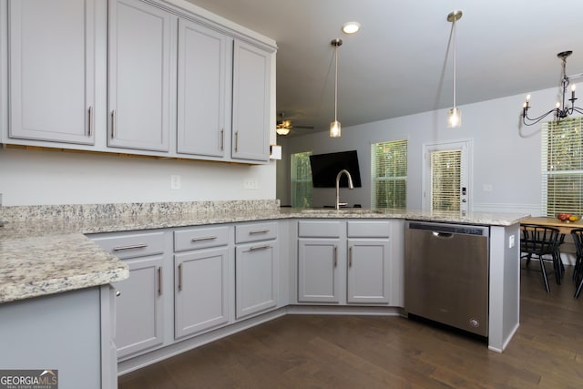 5620 Berney Cir, Powder Springs, GA 30127 - kitchen featuring dishwasher, dark wood-type flooring, decorative light fixtures, a peninsula, and a sink
