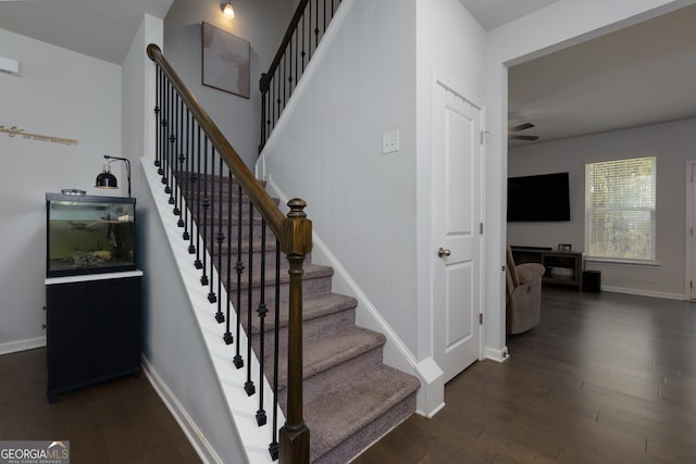 5620 Berney Cir, Powder Springs, GA 30127 - stairs with baseboards and wood finished floors