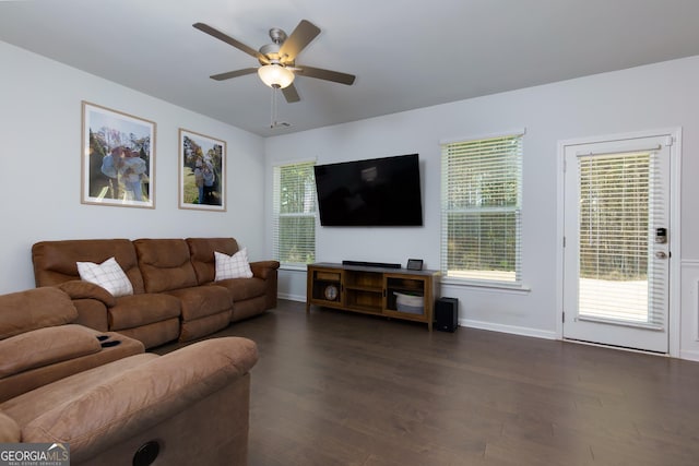 5620 Berney Cir, Powder Springs, GA 30127 - living room featuring ceiling fan, baseboards, and dark wood-type flooring