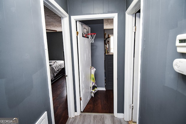 hallway featuring wood finished floors