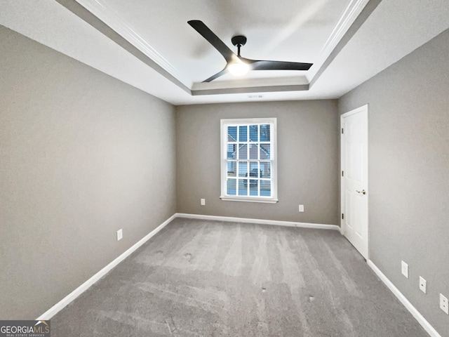 2708 Stockbridge Way, Dacula, GA 30019 - unfurnished room with a tray ceiling, carpet, and a ceiling fan