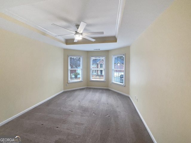 2708 Stockbridge Way, Dacula, GA 30019 - carpeted spare room with a tray ceiling, a ceiling fan, and ornamental molding