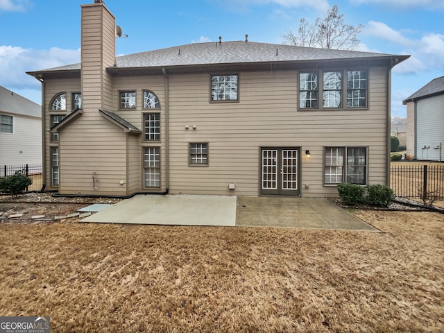 2708 Stockbridge Way, Dacula, GA 30019 - rear view of property with a patio area, a chimney, and roof with shingles