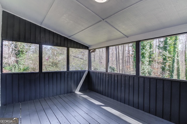 unfurnished sunroom with vaulted ceiling and a sauna