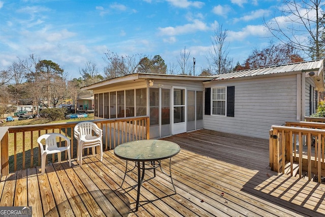 deck featuring a sunroom