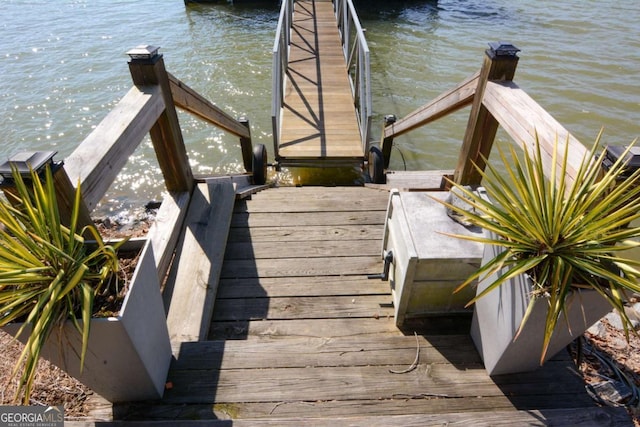 view of dock featuring a water view