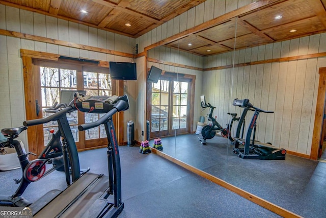 workout area with recessed lighting, wood ceiling, and wooden walls