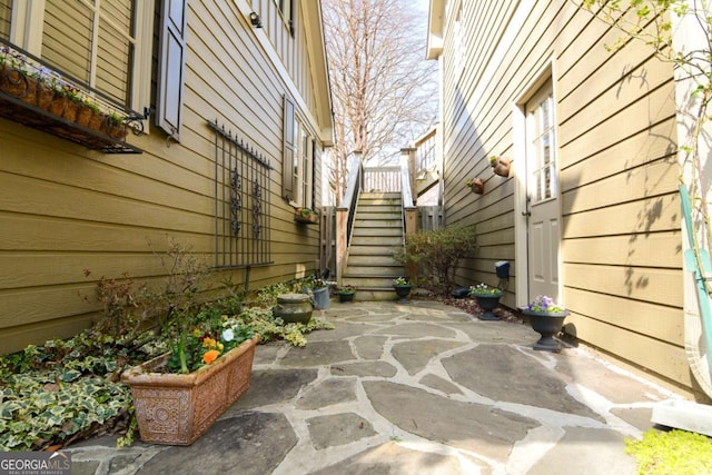 view of patio / terrace featuring stairs