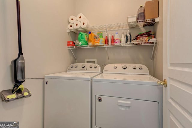 laundry room with laundry area and washing machine and dryer