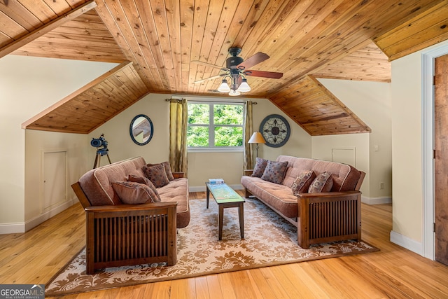 living area with hardwood / wood-style flooring, wood ceiling, baseboards, and vaulted ceiling