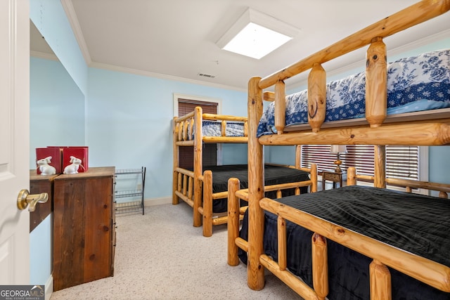 bedroom featuring ornamental molding, visible vents, and baseboards