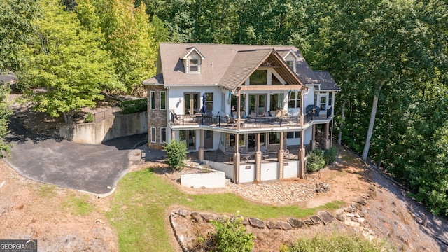 exterior space featuring a deck and a patio area