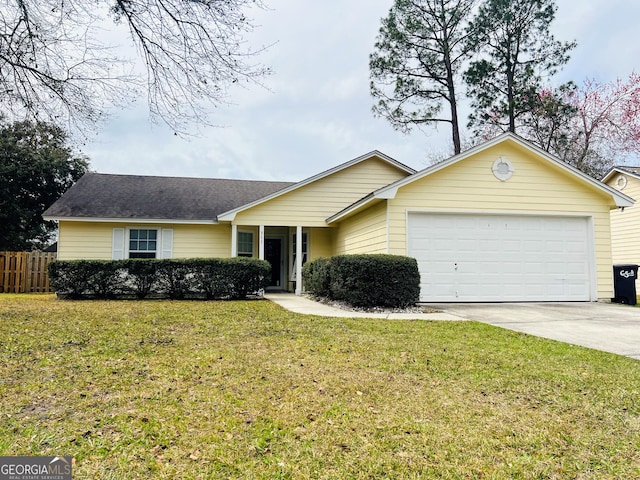 ranch-style house featuring roof with shingles, a front yard, fence, a garage, and driveway