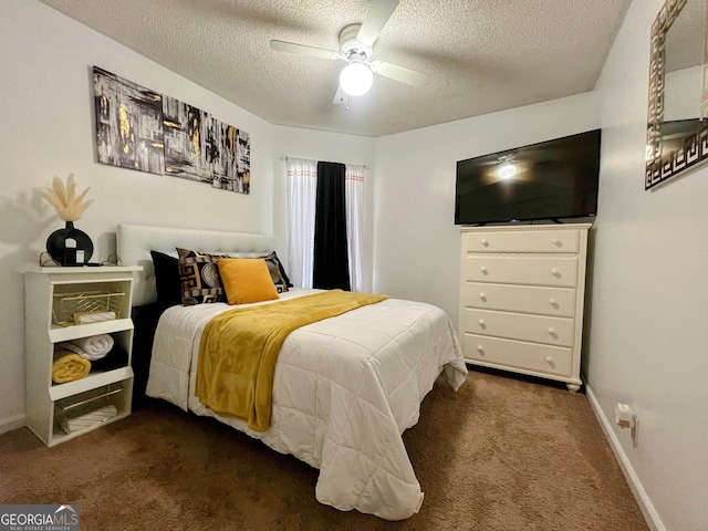 bedroom featuring carpet flooring, ceiling fan, a textured ceiling, and baseboards